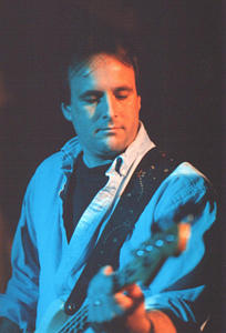 Brian Dubreuil - vocals, acoustic/electric guitars, bass